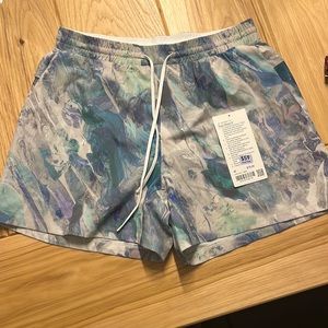 Men’s lulu lemon 5” swim shorts. Blue marble design and never worn.